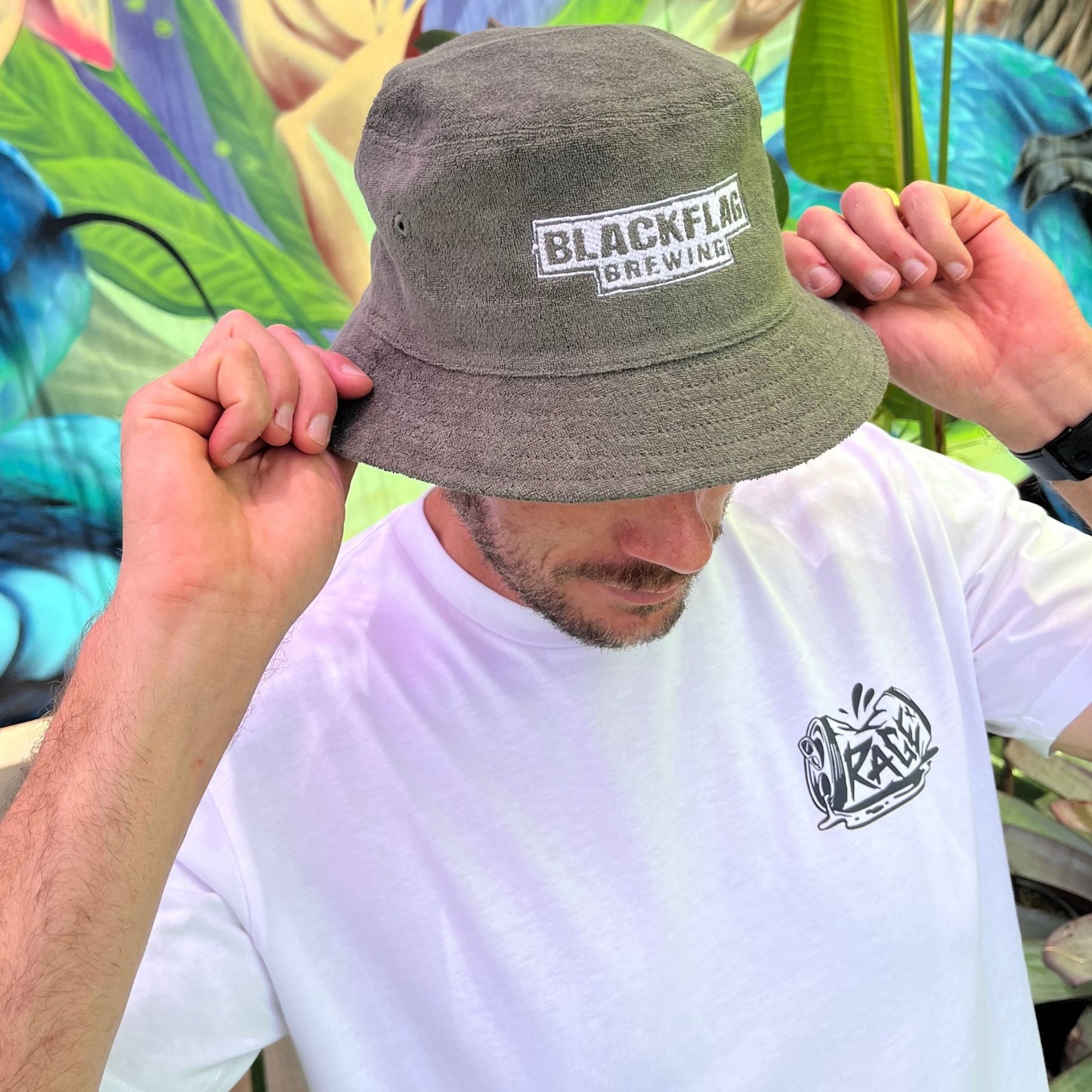 Blackflag terry bucket hat with white Blackflag Brewing logo embroidered on the front.